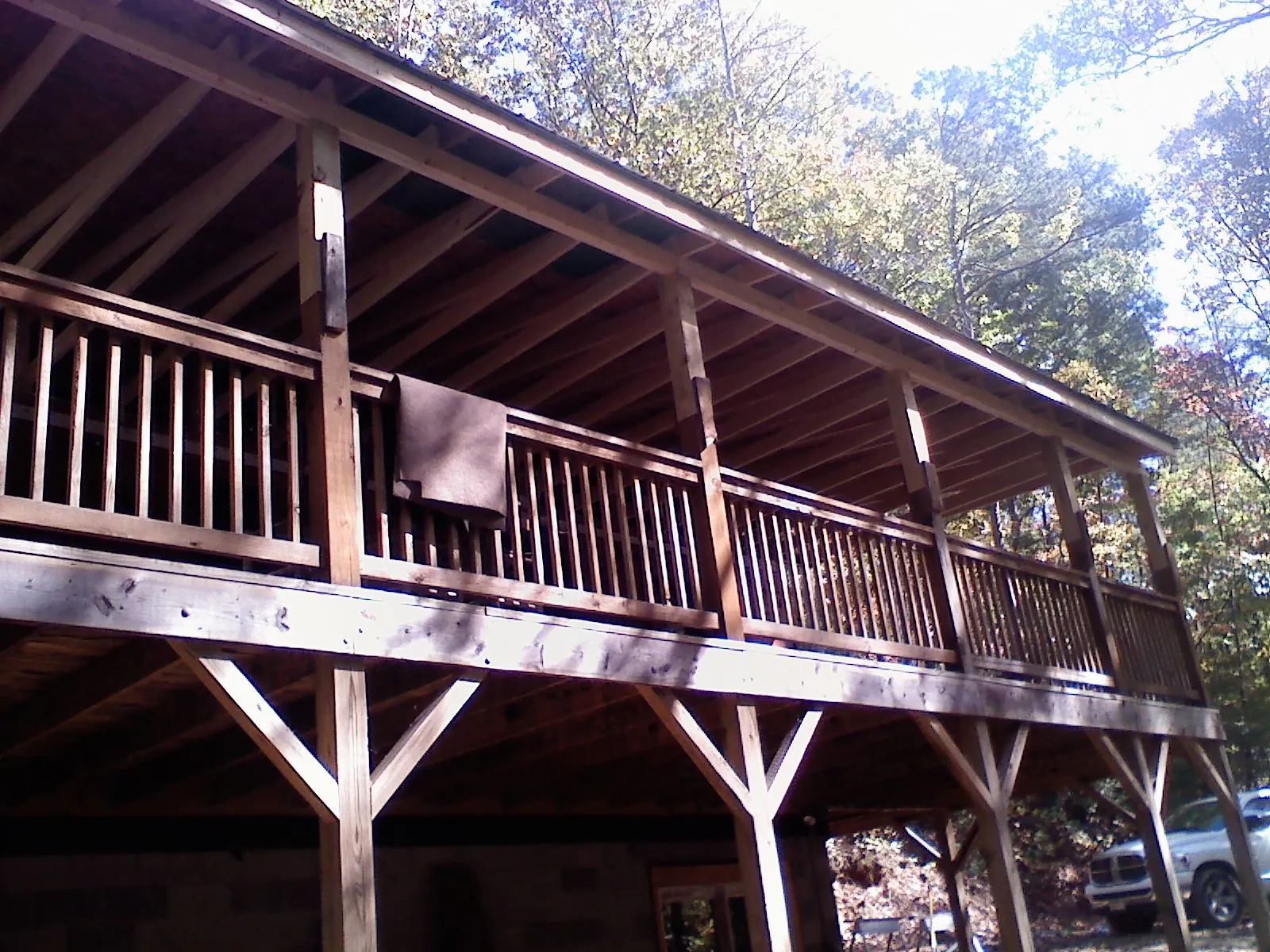 Timber framing under a new elevated porch and deck in Sparks